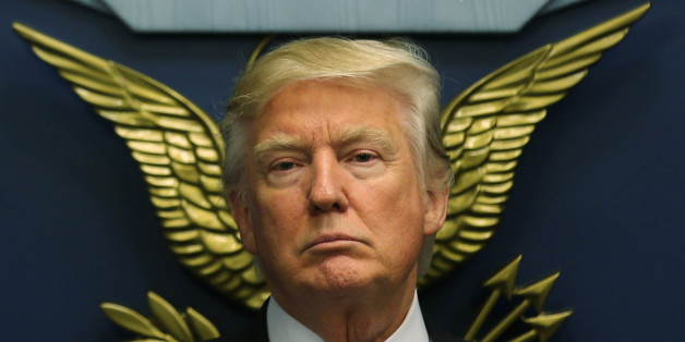 U.S. President Donald Trump looks on following a swearing-in ceremony for Defense Secretary James Mattis at the Pentagon in Washington, U.S., January 27, 2017. REUTERS/Carlos Barria -TPX IMAGES OF THE DAY