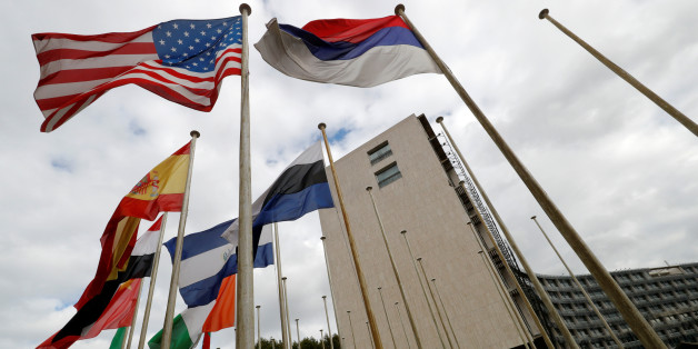 An American flag flies outside the headquarters of the United Nations Educational, Scientific and Cultural Organization (UNESCO) in Paris, France, October 12, 2017. REUTERS/Philippe Wojazer