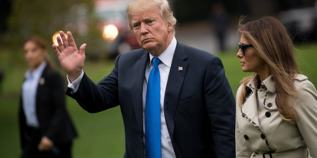 WASHINGTON, DC - OCTOBER 13: (L to R) President U.S. President Donald Trump and first lady Melania Trump exit Marine One on the South Lawn of the White House, October 13, 2017 in Washington, DC. President Trump and the first lady were returning from a visit to the U.S. Secret Service training facility in Beltsville, Maryland. (Photo by Drew Angerer/Getty Images)