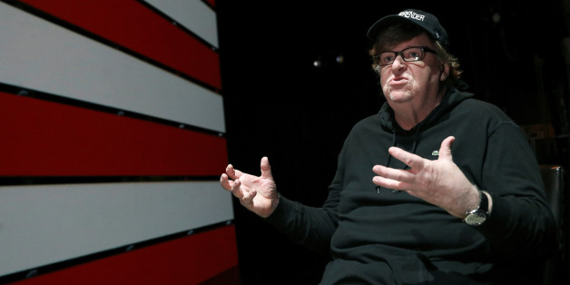 Michael Moore speaks during an interview at the site of his one-man Broadway show at the Belasco Theatre in Manhattan, New York, U.S., August 17, 2017. REUTERS/Shannon Stapleton