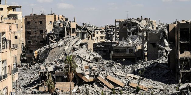 A general view taken on October 1, 2017 shows debris near the central hospital of Raqa, which is one of the Islamic State (IS) group's last positions on the frontline.Syrian fighters backed by US special forces are battling to clear the last remaining Islamic State group jihadists holed up in their crumbling stronghold of Raqa. / AFP PHOTO / BULENT KILIC (Photo credit should read BULENT KILIC/AFP/Getty Images)