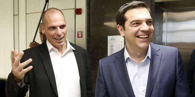 Greek Finance Minister Yanis Varoufakis (L) welcomes Prime Minister Alexis Tsipras for a meeting at the ministry in Athens, Greece May 27, 2015. Fiscal targets, pension and labour market reform and the size of the civil service are the key issues yet to be agreed between Greece and its international creditors in debt talks as Athens' cash dries up, the European Commission said on Wednesday. REUTERS/Alkis Konstantinidis TPX IMAGES OF THE DAY