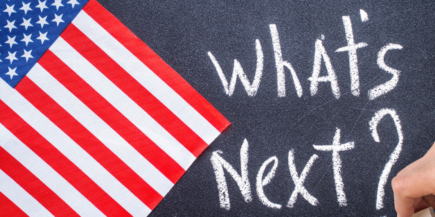 What's next on the chalk board and US flag. Election concept