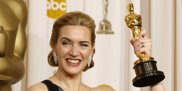 Best actress winner Kate Winslet of England poses with her Oscar for her role in "The Reader" backstage at the 81st Academy Awards in Hollywood, California, February 22, 2009. REUTERS/Mike Blake (UNITED STATES) (OSCARS-BACKSTAGE)