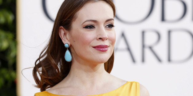 Actress Alyssa Milano arrives at the 70th annual Golden Globe Awards in Beverly Hills, California, January 13, 2013. REUTERS/Mario Anzuoni (UNITED STATES - Tags: ENTERTAINMENT) (GOLDENGLOBES-ARRIVALS)