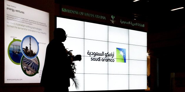 A Saudi Arabian Oil Co. (Aramco) logo sits on an electronic display at the company's corporate pavilion during the 22nd World Petroleum Congress in Istanbul, Turkey, on Wednesday, July 12, 2017. Oil fell from the lowest closing price in two weeks as talk of Libya and Nigeria being requested to cap their production failed to dispel doubts about the effectiveness of OPECs cut. Photographer: Kostas Tsironis/Bloomberg via Getty Images