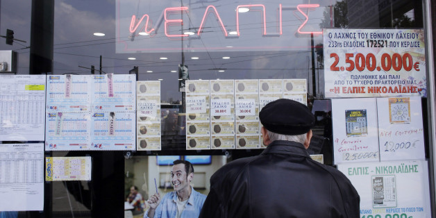 ATHENS, GREECE - MARCH 16: Eldery man looks at Lotto results on March 16, 2017 in Athens, Greece. Greece has introduced 13 austerity packages since February 2010 and received its first financial bailout from the European Union and the International Monetary Fund (IMF) in May 2010. Since then they received a second bailout in March 2012 and a final bailout was negotiated in 2015 of 86 billion euros to be handed to Greece gradually until June 2018 if they complied with austerity measures requi