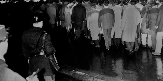 PARIS, FRANCE - OCTOBER 17: Algerians peacefully protest against the imposed curfew on October 17, 1961 in Paris, France. (Photo by L HUMANITE/KEYSTONE-FRANCE/Gamma-Rapho via Getty Images)