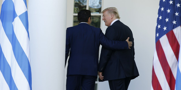 Greek Prime Minister Alexis Tsipras and U.S. President Donald Trump return to the Oval Office after a joint news conference in the Rose Garden of the White House in Washington, U.S., October 17, 2017. REUTERS/Joshua Roberts