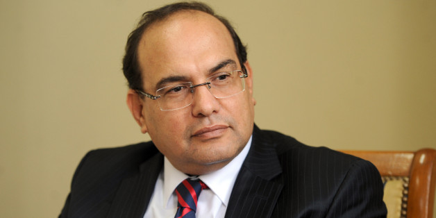 Lawyer and human rights defender Chawki Tabib, one of the contestants for the position of Tunisian Prime Minister, is seen in his office on December 4, 2013 in Tunis. Tabib, who turns 50 at the end of December, had been repeatedly proposed for the premiership by the Popular Front, a leftist grouping of opposition parties, during crisis talks with the ruling Islamists aimed at breaking months of political deadlock. AFP PHOTO / FETHI BELAID (Photo credit should read FETHI BELAID/AFP/Getty I