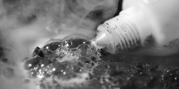 Plastic bottle with spilled acid