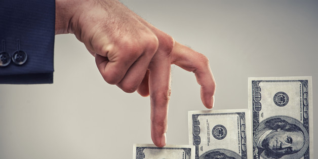 Close up concept shot of fingers walking crawling up a pile of one hundred dollar billshttp://195.154.178.81/DATA/i_collage/pi/shoots/783303.jpg