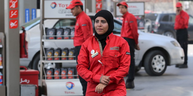 A female employee is seen as she works at a petrol station in Cairo, Egypt, February 24, 2016. A petrol station in the Egyptian capital Cairo hires women to work as attendants - until now, petrol stations were staffed almost exclusively by men. Picture taken February 24, 2016. REUTERS/Mohamed Abd El Ghany