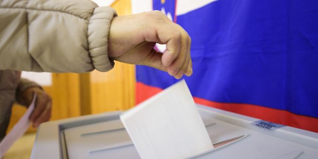 A slovenian citizen casts her ballot for the first round of the presidential election at a polling station in Ljubljana, on October 22, 2017.
Slovenian citizens started voting on October 22 in a presidential election in which incumbent head of state Borut Pahor was expected to be re-elected. Some 1.7 million citizens were eligible to cast their vote, with partial results expected later in the evening.
/ AFP PHOTO / Jure Makovec (Photo credit should read JURE MAKOVEC/AFP/Getty Images)