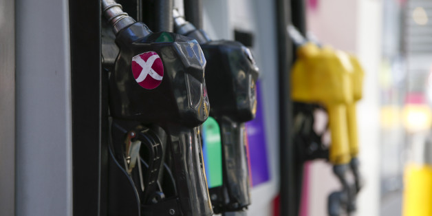 BUENOS AIRES, ARGENTINA - JANUARY 06: Close-up of pump nozzles for different fuels on an AXION gas station on January 06, 2016 in Buenos Aires, Argentina. Minister of Energy Juan Jose Aranguren and oil companies agreed on a 6% rise. According to the FECOBA fuel retailers federations president Luis Malchiodi another 6% rise will come in March (Photo by Gabriel Rossi/LatinContent/Getty Images)