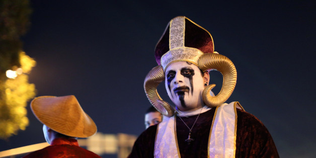Revellers celebrate in costume at the West Hollywood Halloween Carnaval in West Hollywood, California, U.S., October 31, 2016. Picture taken October 31, 2016. REUTERS/David McNew