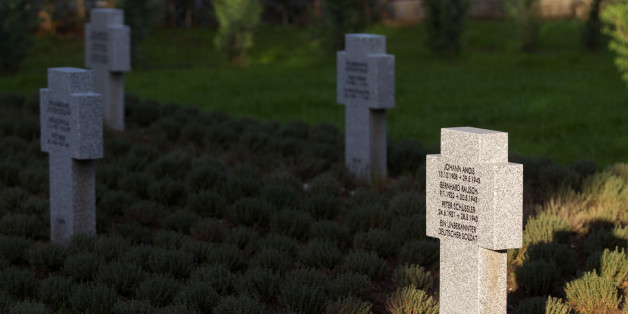 Crosses of killed german WWII soldiers are seen at the newly opened cemetary for German WWII soldiers, in the airforce military base in Podgorica, Montenegro, November 19, 2016. REUTERS/Stevo Vasiljevic