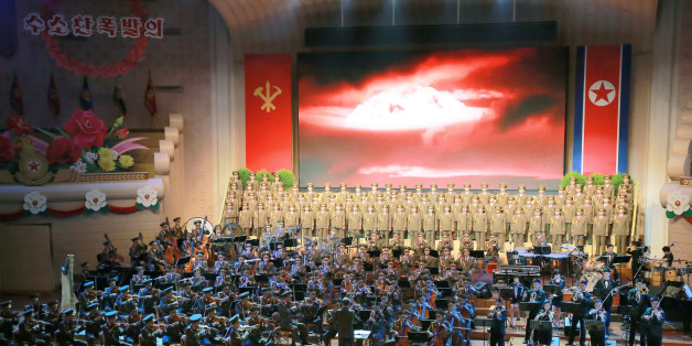 People perform for North Korean leader Kim Jong Un during a celebration for nuclear scientists and engineers who contributed to a hydrogen bomb test, in this undated photo released by North Korea's Korean Central News Agency (KCNA) in Pyongyang on September 10, 2017. KCNA via REUTERS ATTENTION EDITORS - THIS PICTURE WAS PROVIDED BY A THIRD PARTY. REUTERS IS UNABLE TO INDEPENDENTLY VERIFY THE AUTHENTICITY, CONTENT, LOCATION OR DATE OF THIS IMAGE. NO THIRD PARTY SALES. SOUTH KOREA OUT. NO COMMERCIAL OR EDITORIAL SALES IN SOUTH KOREA. THIS PICTURE IS DISTRIBUTED EXACTLY AS RECEIVED BY REUTERS, AS A SERVICE TO CLIENTS.