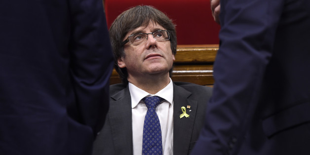 Catalan president Carles Puigdemont attends a session of the Catalan parliament in Barcelona on October 27, 2017.
The Catalan parliament will vote on how to respond to the central government's planned takeover of Catalan political powers following an outlawed independence referendum.
/ AFP PHOTO / Josep LAGO (Photo credit should read JOSEP LAGO/AFP/Getty Images)