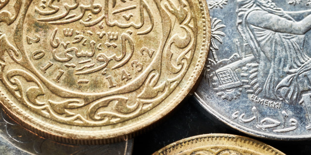Close up picture of Tunisian dinars, shallow depth of field.