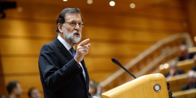 Spain's Prime Minister Mariano Rajoy gives a speech during a session of the Upper House of Parliament in Madrid on October 27, 2017.The central government has invoked the never-before-used article 155 of the Constitution, designed to rein in rebel regions, as it seeks to end Catalonia's drive to break from Spain. Spain's upper house is in charge of approving or rejecting the power seizure of the semi-autonomous Catalonia region proposed by Madrid. / AFP PHOTO / OSCAR DEL POZO (Photo cred