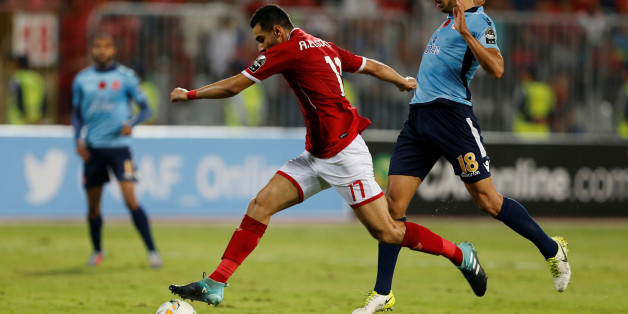 Soccer Football - CAF Champions League - Final - Al Ahly vs Wydad Casablanca - Borg El Arab Stadium, Alexandria, Egypt - October 28, 2017 Al Ahly's Ahmed Hamoudi in action with Wydad's Walid El Karti REUTERS/Amr Abdallah Dalsh