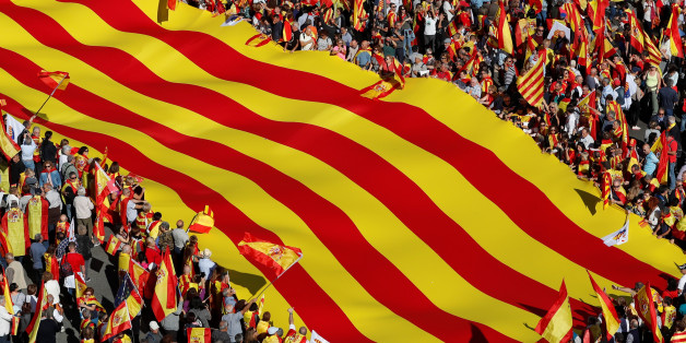 Pro-unity supporters take part in a demonstration in central Barcelona, Spain, October 29, 2017. REUTERS/Yves Herman