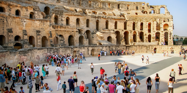 Mahdia, Tunisia - September 03, 2007. Tourists in ruins of El Djem amphitheatre, the most impressive Roman remains in Africa. UNESCO World Heritage Site.