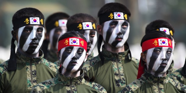 This picture taken on September 25, 2017 shows South Korean Special Army soldiers performing martial arts during a media day presentation of a commemoration event marking South Korea's Armed Forces Day, which will fall on October 1, at the Second Fleet Command of Navy in Pyeongtaek. / AFP PHOTO / JUNG Yeon-Je (Photo credit should read JUNG YEON-JE/AFP/Getty Images)