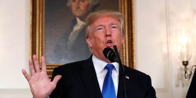 U.S. President Donald Trump speaks about Iran and the Iran nuclear deal in front of a portrait of President George Washington in the Diplomatic Room of the White House in Washington, U.S., October 13, 2017. REUTERS/Kevin Lamarque TPX IMAGES OF THE DAY
