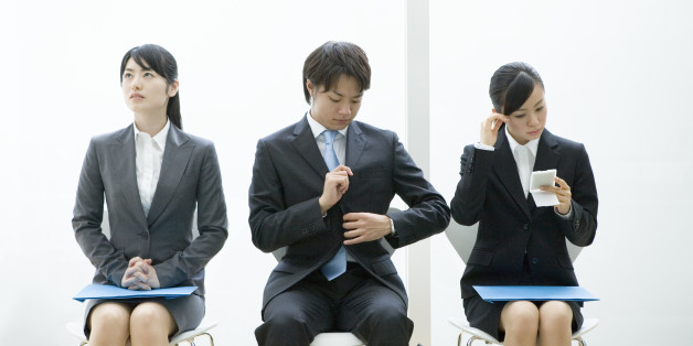 Men and women waiting for their turn for interview