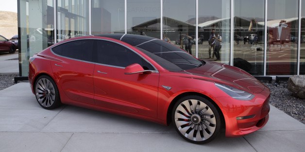 A Tesla Motor Inc. Model 3 vehicle is displayed outside the company's Gigafactory in Sparks, Neveada, U.S., on Tuesday, July 26, 2016. Tesla officially opened its Gigafactory on Tuesday, a little more than two years after construction began. The factory is about 14 percent complete but when it's finished, it will be about 10 million square feet, or about the size of 262 NFL football fields. Photographer: Troy Harvey/Bloomberg via Getty Images