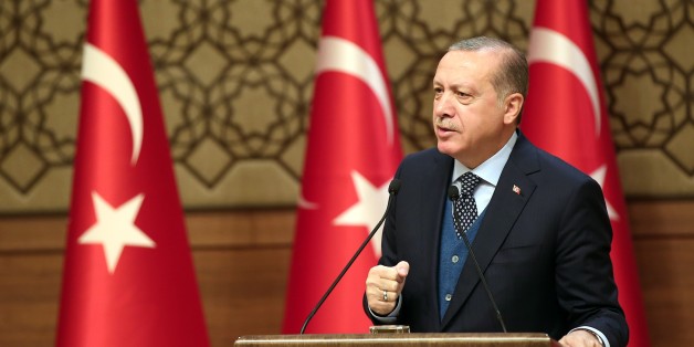 ANKARA, TURKEY - NOVEMBER 02 : (----EDITORIAL USE ONLY MANDATORY CREDIT - ' TURKISH PRESIDENCY / YASIN BULBUL / HANDOUT' - NO MARKETING NO ADVERTISING CAMPAIGNS - DISTRIBUTED AS A SERVICE TO CLIENTS----) President of Turkey Recep Tayyip Erdogan (C) gives a speech during the launch of the automobile industrys joint domestic venture at the Presidential Complex in Ankara, Turkey on November 02, 2017. Turkey launched a joint venture to produce its first domestically-produced car in capital Ankara. Erdogan announced that five automotive supplier firms -- Anadolu Group, BMC, Kiraca Holding, Turkcell, and Zorlu Holding -- will jointly manufacture Turkey's first car. Erdogan said he expected the prototype of the first domestically-produced car to be ready in 2019 and sales to start in 2021. (Photo by Turkish Presidency / Yasin Bulbul/Anadolu Agency/Getty Images)
