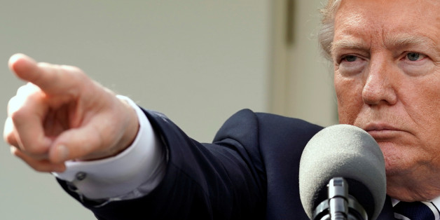 U.S. President Donald Trump gestures at a news conference in the Rose Garden of the White House in Washington, U.S., October 16, 2017. REUTERS/Yuri Gripas