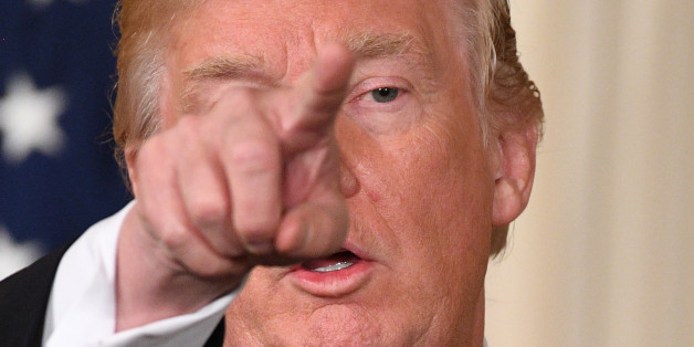 US President Donald Trump gestures during a joint press conference with Kuwaiti Emir Sheikh Sabah al-Ahmad Al-Sabah at the White House in Washington, DC, on September 7 2017. / AFP PHOTO / JIM WATSON (Photo credit should read JIM WATSON/AFP/Getty Images)