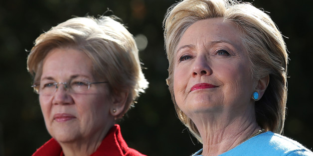 Democratic U.S. presidential nominee Hillary Clinton attends a campaign rally accompanied by U.S. Senator Elizabeth Warren (D-MA) at Alumni Hall Courtyard, Saint Anselm College in Manchester, New Hampshire U.S., October 24, 2016. REUTERS/Carlos Barria