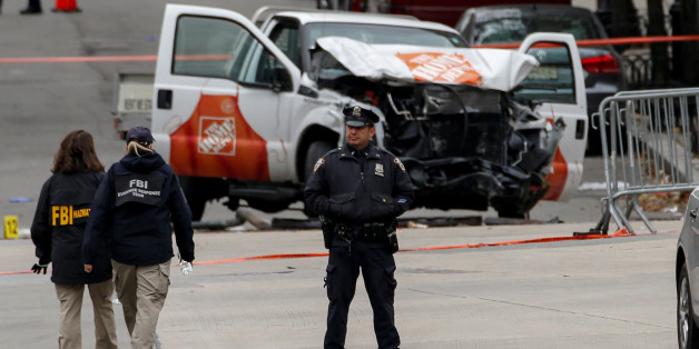 FBI agents and New York City Police Department (NYPD) investigate a pickup truck used in an attack on the West Side Highway in lower Manhattan in New York City, U.S., November 1, 2017. REUTERS/Brendan McDermid
