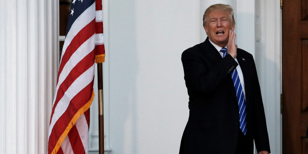 U.S. President-elect Donald Trump yells to members of the media from the steps of the main clubhouse at Trump National Golf Club in Bedminster, New Jersey, U.S., November 19, 2016. REUTERS/Mike Segar TPX IMAGES OF THE DAY