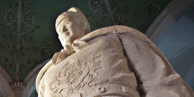 SHANGHAI, CHINA - JULY 6: (CHINA OUT) A worker inspects a statue of Chinese ancient voyager Zheng He (1371-1435), preparing for the 'Zheng He Ocean Voyages Exhibition & International Marine Expo' on July 6, 2005 in Shanghai, China. The exhibition and expo will be held on July 8 in Shanghai to mark the 600th anniversary of the voyager's epic journey. Various activities are being held in China to celebrate the anniversary of Zheng's seven voyages, in which he sailed from China to more than 30 coun