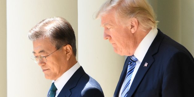 South Korean President Moon Jae-in (L) and US President Donald Trump arrive for a joint press conference in the Rose Garden at the White House in Washington, DC, on June 30, 2017. / AFP PHOTO / JIM WATSON (Photo credit should read JIM WATSON/AFP/Getty Images)