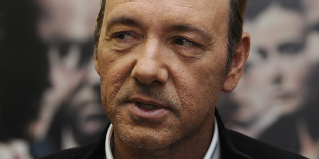 U.S. actor Kevin Spacey poses during a media event to promote his latest movie "Margin Call" in the auditorium of the newly opened Niemeyer Centre, a cultural complex designed by Brazilian architect Oscar Niemeyer, in Aviles, northern Spain September 26, 2011. REUTERS/Eloy Alonso (SPAIN - Tags: ENTERTAINMENT)