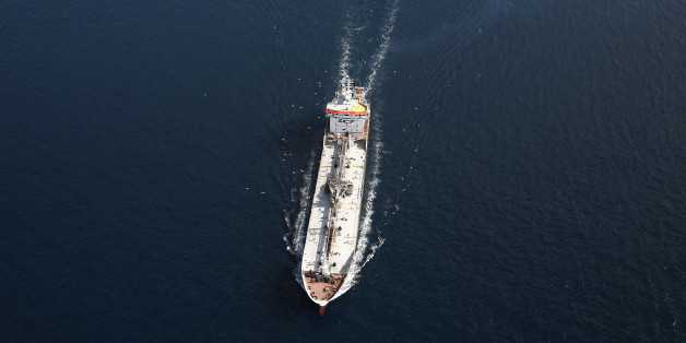 A tanker operated by SCF Group sails from port in the Aegean sea off the coast of Athens, Greece, on Thursday, June 25, 2015. Greece could tap euro-area funds of as much as 3.35 billion euros ($3.75 billion) by early July if it can reach a deal with its creditors, thanks to profit-sharing pledges from member nations' central banks. Photographer: Simon Dawson/Bloomberg via Getty Images