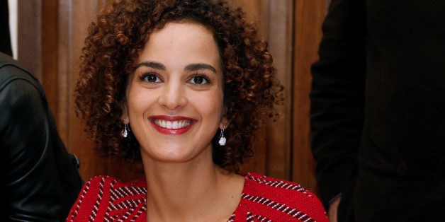 Moroccan-French author Leila Slimani reacts at the Drouant restaurant after she received the French literary prize Prix Goncourt for her novel "Chanson douce" (Sweet Song), in Paris, France, November 3, 2016. REUTERS/Jacky Naegelen
