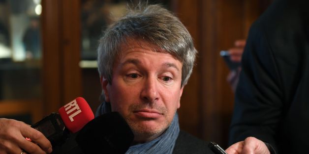 French writer Eric Vuillard reacts as he speaks to journalists after being awarded with the Prix Goncourt for 'L'Ordre du Jour' on November 6, 2017 at the restaurant Drouant in Paris. / AFP PHOTO / Eric FEFERBERG (Photo credit should read ERIC FEFERBERG/AFP/Getty Images)
