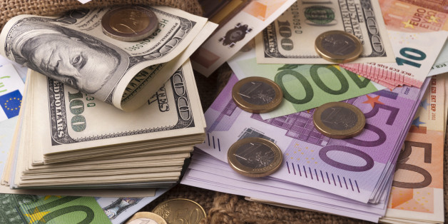 Paper money euro dollar banknotes coins sack