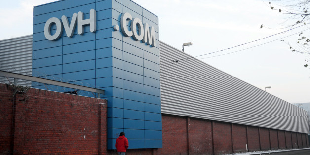 A man passes by the headquarters of French web provider OVH on December 3, 2010 in Roubaix, western france. OVH said today it would ask a judge to rule on whether it can continue to host WikiLeaks after the government called for the whistleblower website to be kicked out of France. The legal challenge came after French Industry Minister Eric Besson called for WikiLeaks to be banned from French servers after the site took refuge there on Thursday, having been expelled from the United States. AFP