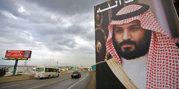 A poster of Lebanese Prime Minister Saad Hariri, who resigned last week in a televised speech, hangs on the side of a road with a phrase reading in Arabic, ' God protect you' in the northern Lebanese port city of Tripoli on November 9, 2017.Lebanon's former prime minister Saad Hariri announced his resignation last weekend from the Saudi capital Riyadh in a televised speech which sparked concerns of a political crisis in Lebanon as tensions between Saudi Arabia and Iran escalated. / AFP PHOTO / I