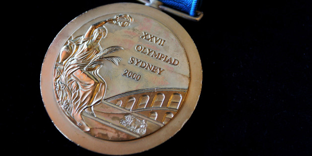 SYDNEY, AUSTRALIA - NOVEMBER 09: The 2000 Olympic Gold Medal won by Michael Diamond as seen at Lawsons Auctioneers on November 9, 2017 in Sydney, Australia. Michael Diamond competed in six Olympic Games and is a dual Olympic gold medalist, who won the men's trap shooting at the Atlanta 1996 and Sydney 2000 Olympic Games. He is selling his Sydney Olympic medal to pay off debts after being acquitted following an 18-month legal battle over drink-driving and firearms charges. (Photo by Lisa Maree