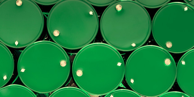 green steel chemical tanks or oil tanks stacked in a row. background and texture
