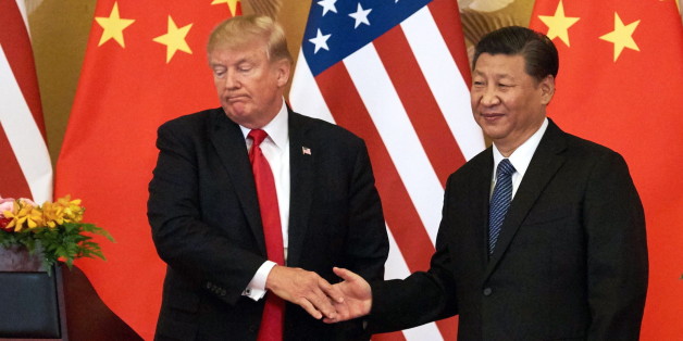 BEIJING, CHINA - NOVEMBER 9, 2017: US President Donald Trump (L) and China's President Xi Jinping shake hands at a press conference following their meeting outside the Great Hall of the People in Beijing. Artyom Ivanov/TASS (Photo by Artyom Ivanov\TASS via Getty Images)